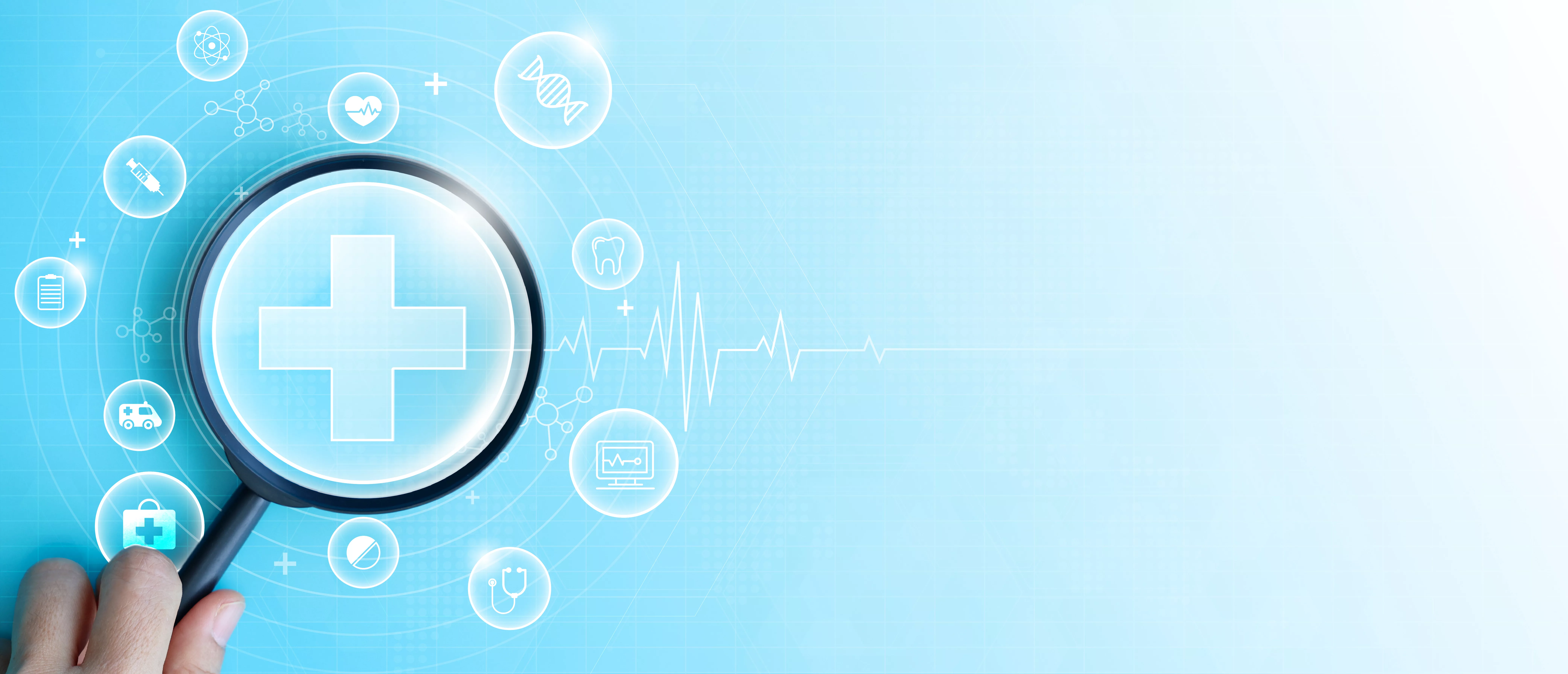 Hand holding magnifying glass focus plus and healthcare medical icon on blue background. health insurance concept and access to welfare. medical technology.